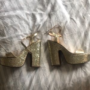 Jessica Simpson gold glitter platform shoes